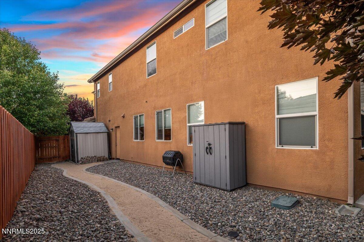 400 Sondrio Court Reno, NV 89521 - Photo 54 of 58 a view of a house with backyard and trees