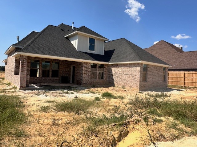 1310 Natashas Way Lumberton, TX 77657 - Photo 21 of 23 a front view of a house with a yard