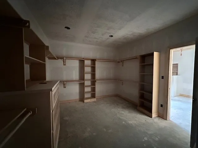 a view of an empty walk in closet