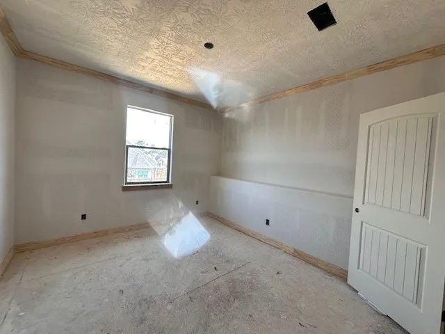 a view of empty room with windows