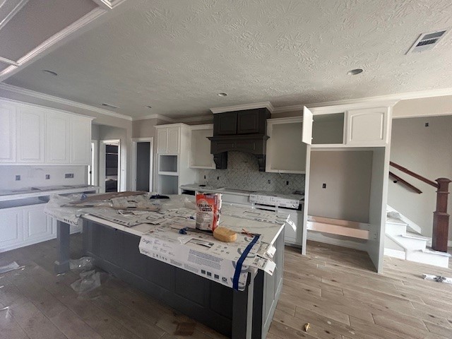1310 Natashas Way Lumberton, TX 77657 - Photo 6 of 23 a kitchen with stainless steel appliances granite countertop a sink stove and refrigerator