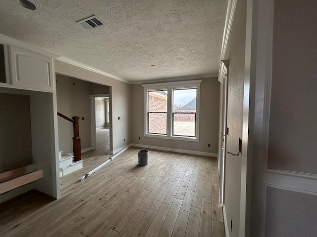 1310 Natashas Way Lumberton, TX 77657 - Photo 7 of 23 a view of a room with wooden floor and window