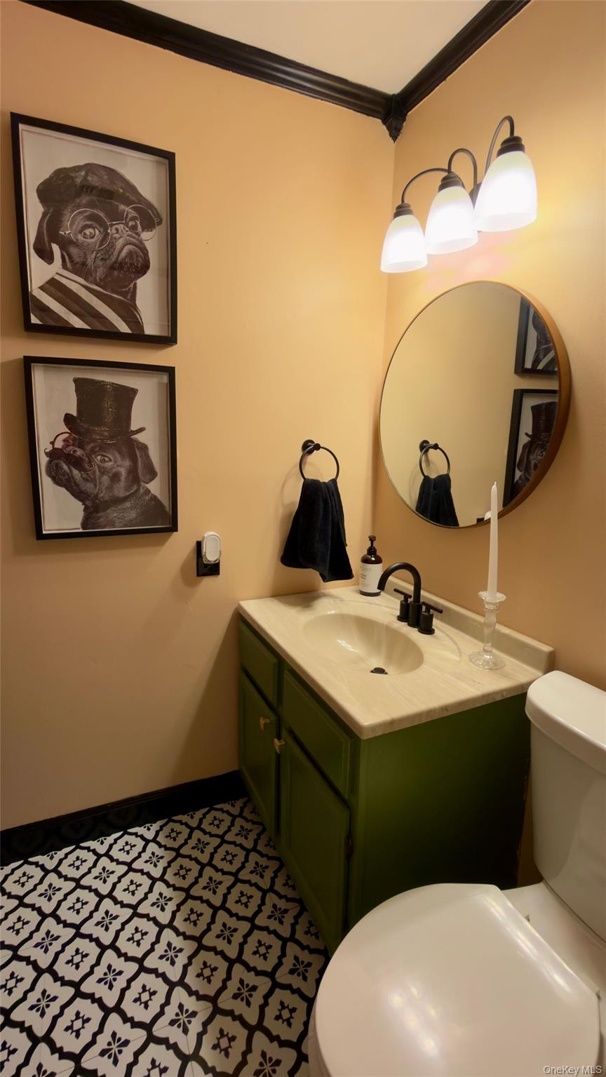 805 Eagles Ridge Road Brewster, NY 10509 - Photo 14 of 22 a bathroom with a sink and mirror