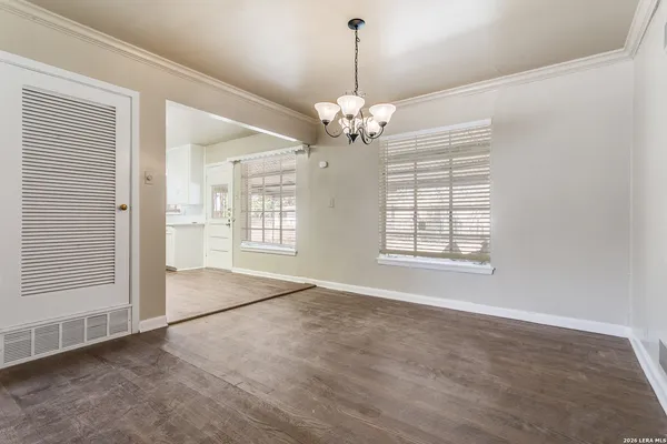 a view of an empty room with a window