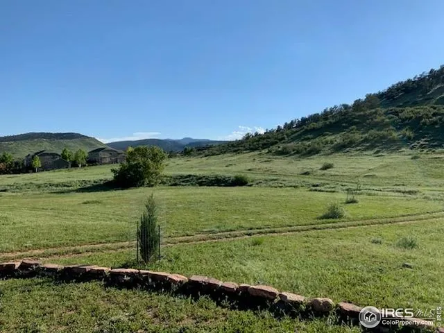a view of swimming pool with a mountain view