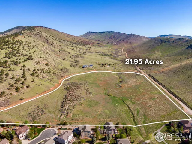 a view of ocean with a mountain