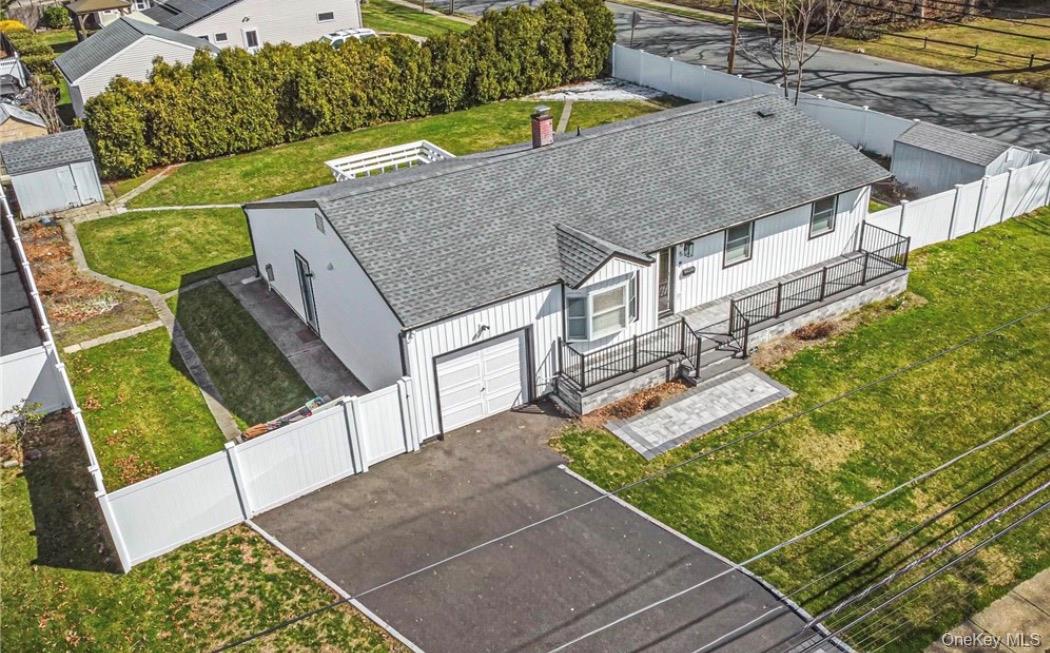 65 39th Street Islip, NY 11751 - Photo 1 of 30 an aerial view of a house with a yard