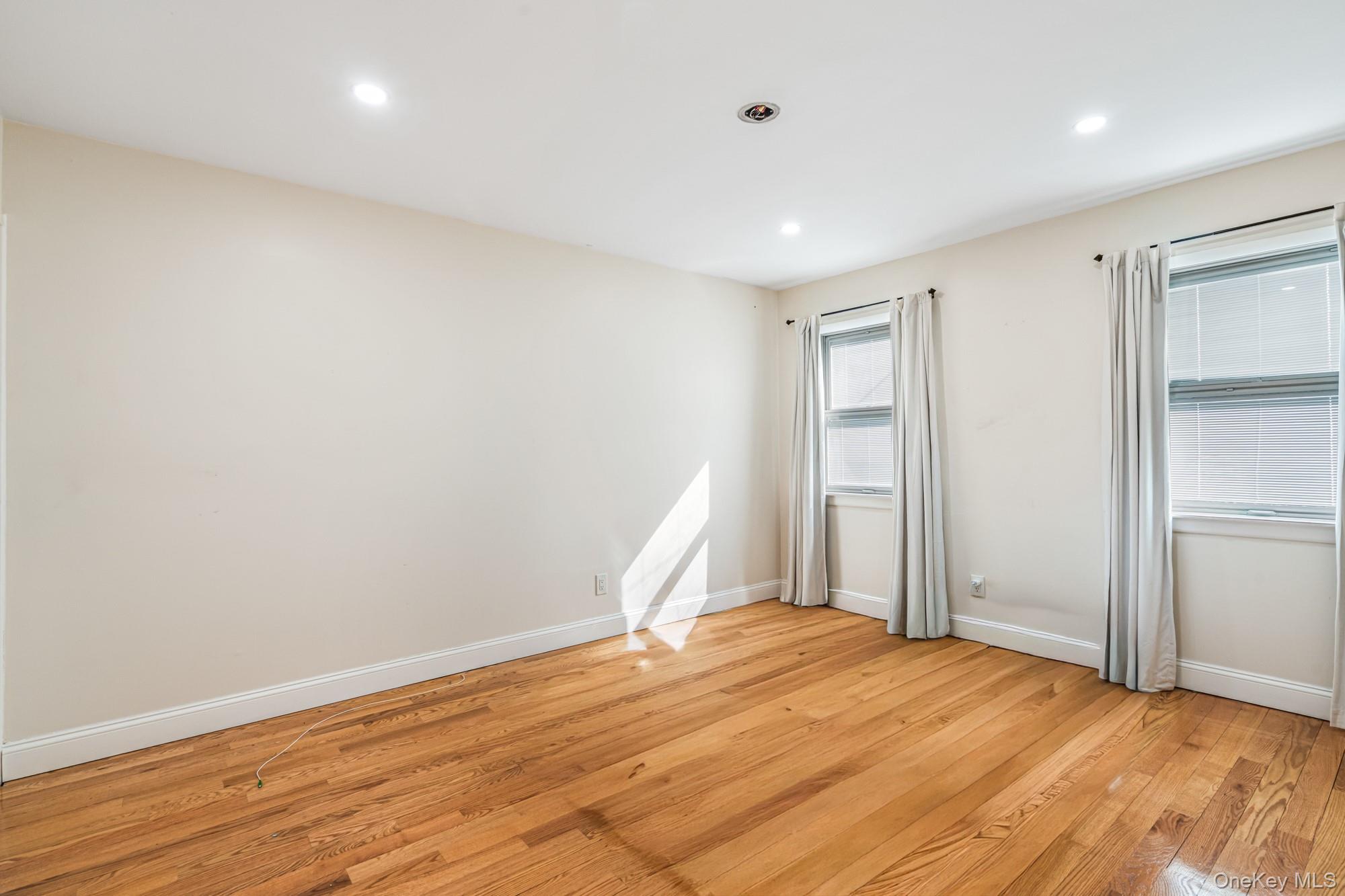 65 39th Street Islip, NY 11751 - Photo 13 of 30 a view of empty room with wooden floor