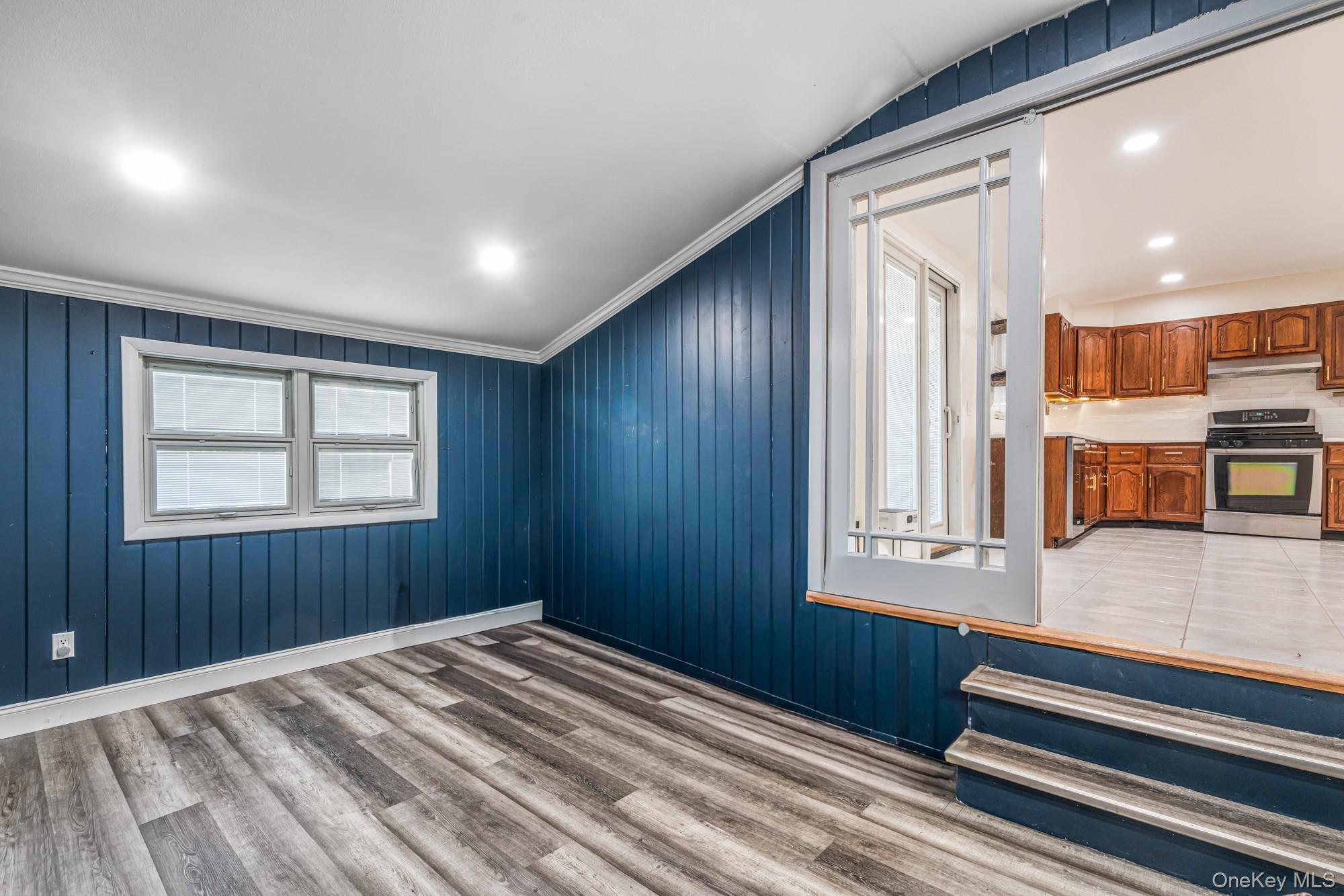 65 39th Street Islip, NY 11751 - Photo 16 of 30 wooden floor and windows in a room