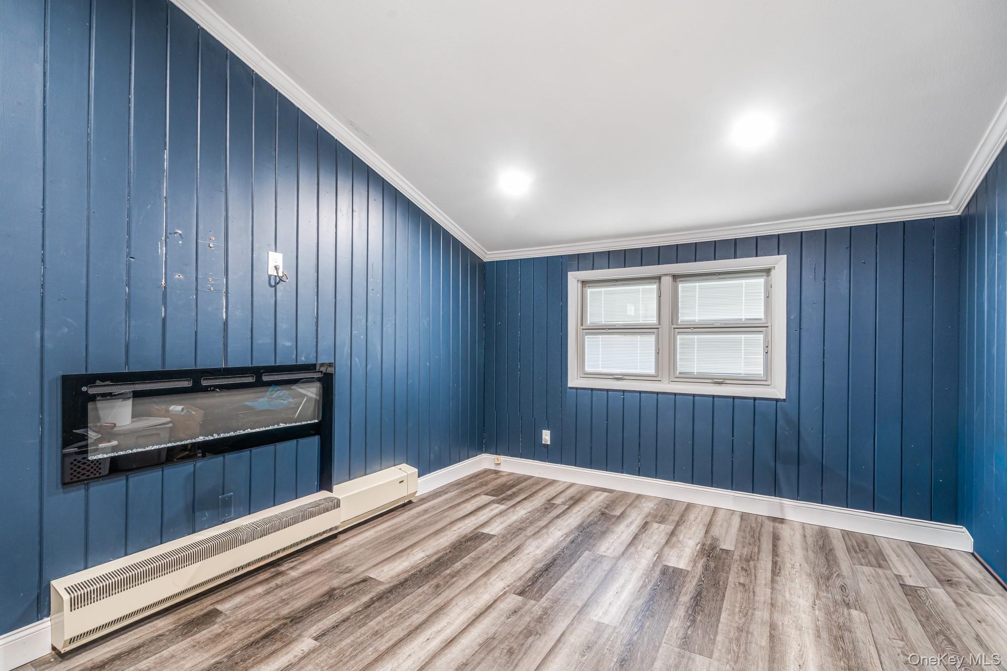 65 39th Street Islip, NY 11751 - Photo 17 of 30 a view of kitchen with refrigerator and window