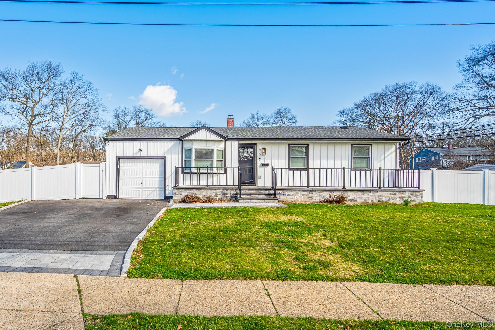 65 39th Street Islip, NY 11751 - Photo 2 of 30 a view of a house with backyard and garden