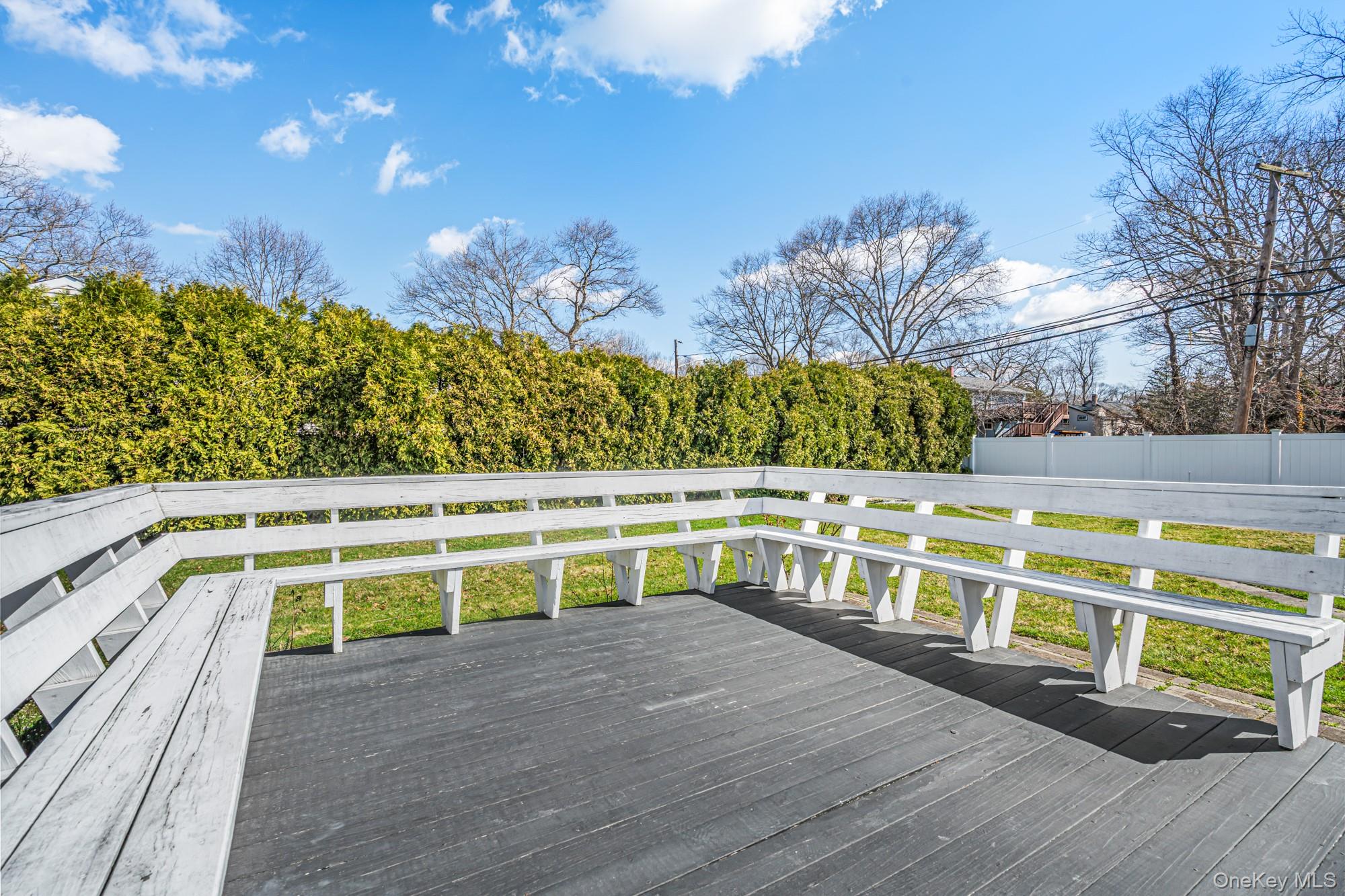 65 39th Street Islip, NY 11751 - Photo 26 of 30 a view of a swimming pool with a bench
