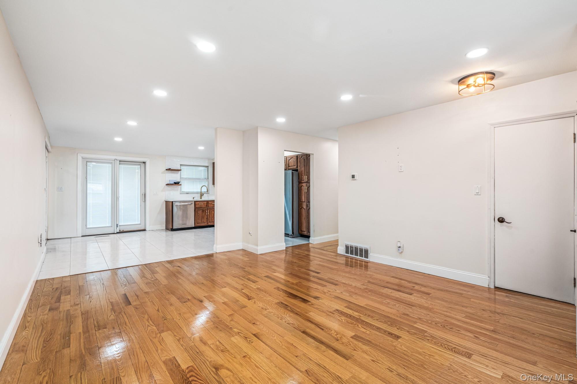 65 39th Street Islip, NY 11751 - Photo 4 of 30 a view of empty room with wooden floor