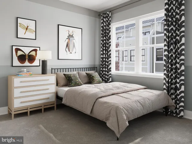 a bedroom with bed and a window