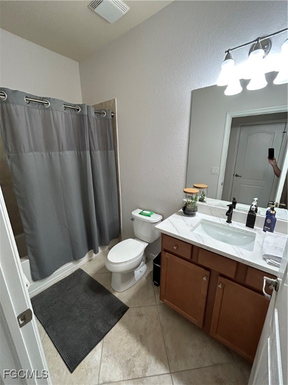 8963 Water Tupelo Road Fort Myers, FL 33912 - Photo 33 of 37 a bathroom with a sink a toilet and a mirror