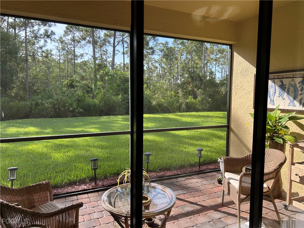 8963 Water Tupelo Road Fort Myers, FL 33912 - Photo 9 of 37 a view of a two chair in the yard