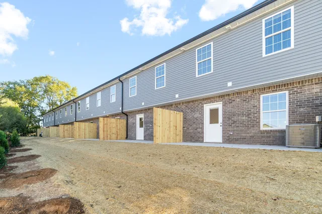 a view of an house with backyard space