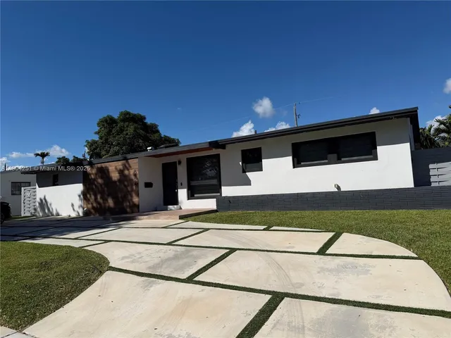 a view of a house with a patio