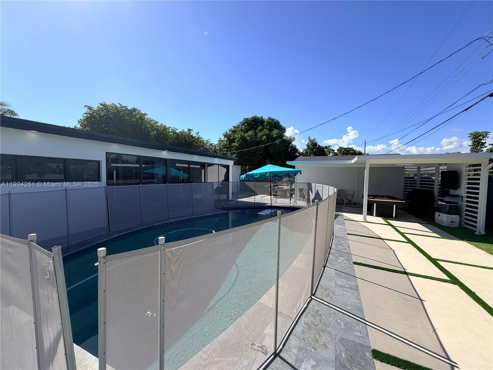 8721 Southwest 191st Street Cutler Bay, FL 33157 - Photo 2 of 15 a view of a terrace with chairs