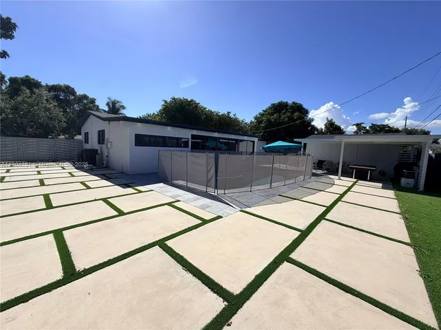 a view of a balcony with a flat screen tv