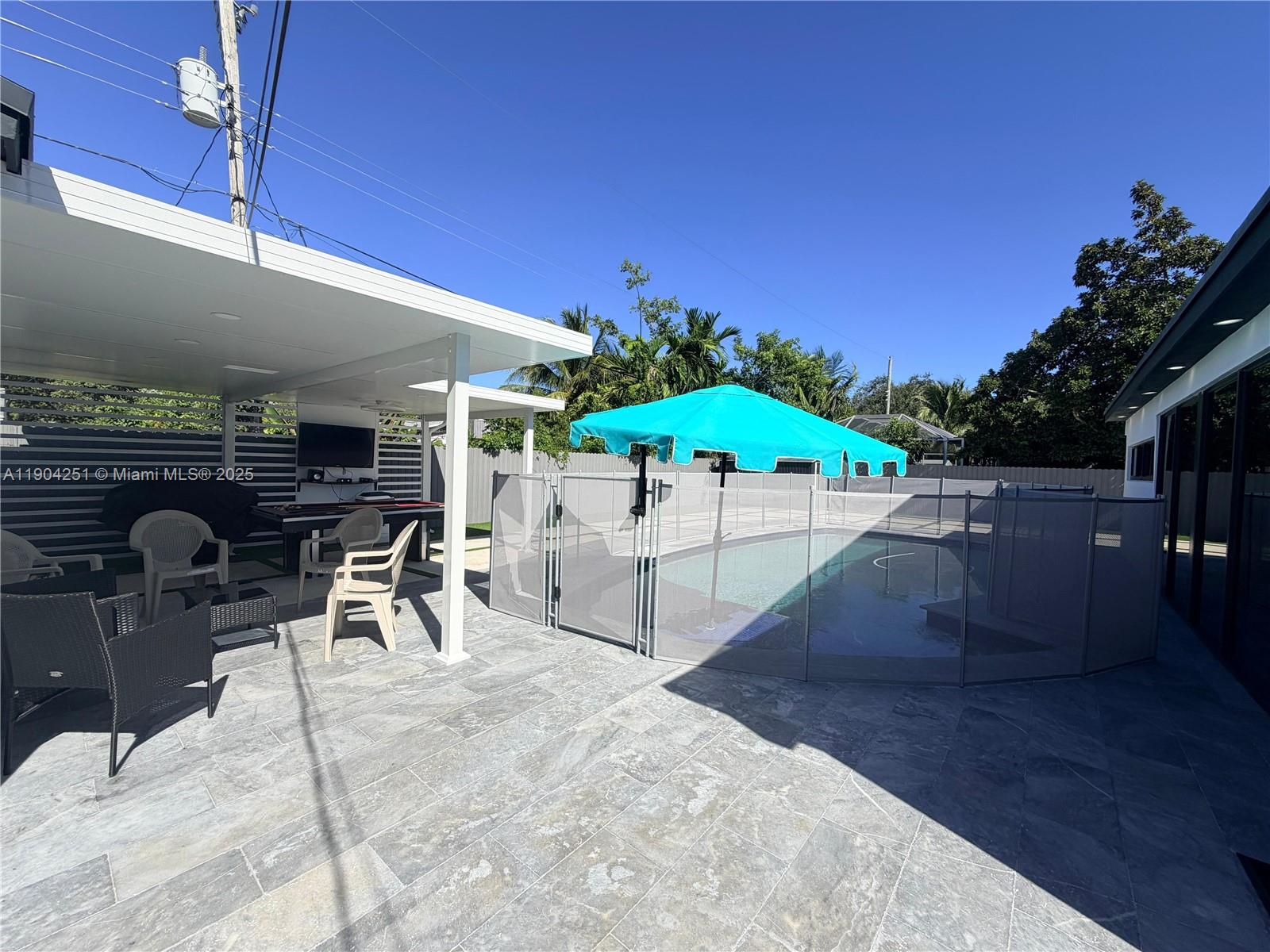 8721 Southwest 191st Street Cutler Bay, FL 33157 - Photo 5 of 15 a view of an outdoor space