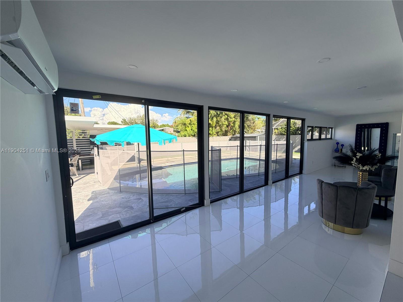 8721 Southwest 191st Street Cutler Bay, FL 33157 - Photo 10 of 15 wooden floor with a outdoor space