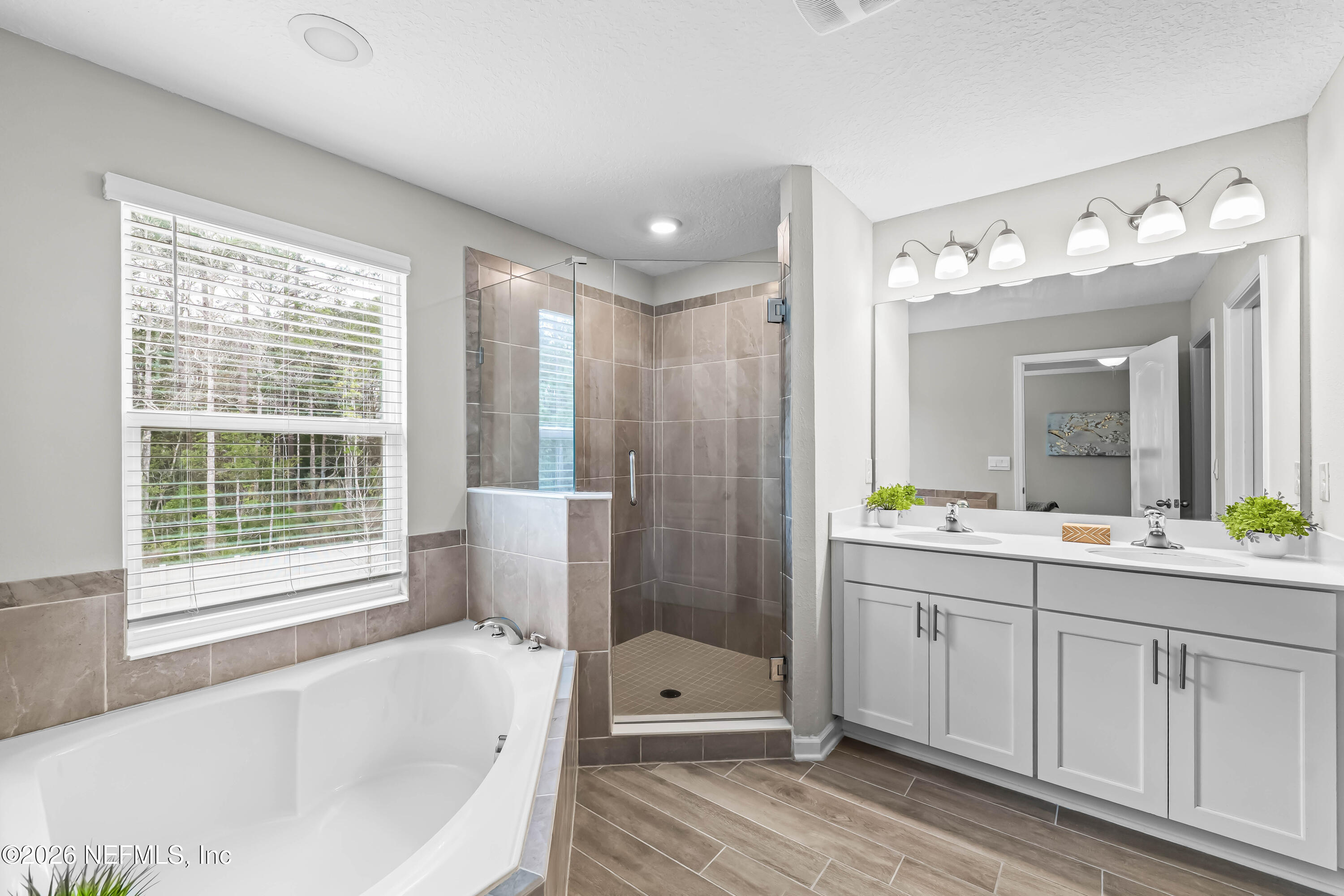 65704 Edgewater Drive Yulee, FL 32097 - Photo 16 of 35 Owner's Bath