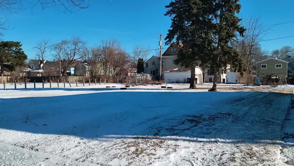 a view of a yard with an outdoor space