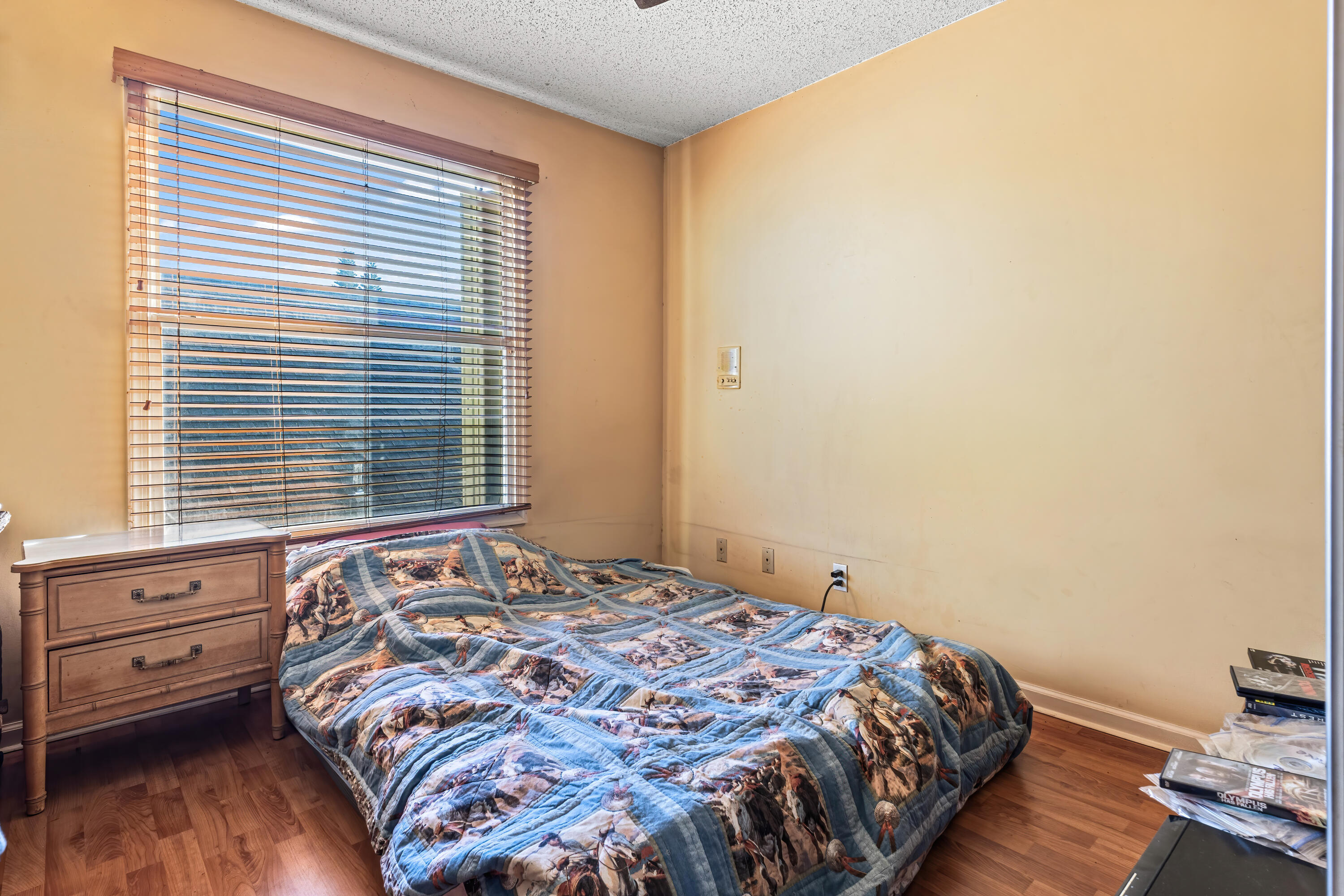 2224 Soundings Court Greenacres, FL 33413 - Photo 16 of 46 a bedroom with a bed and a window