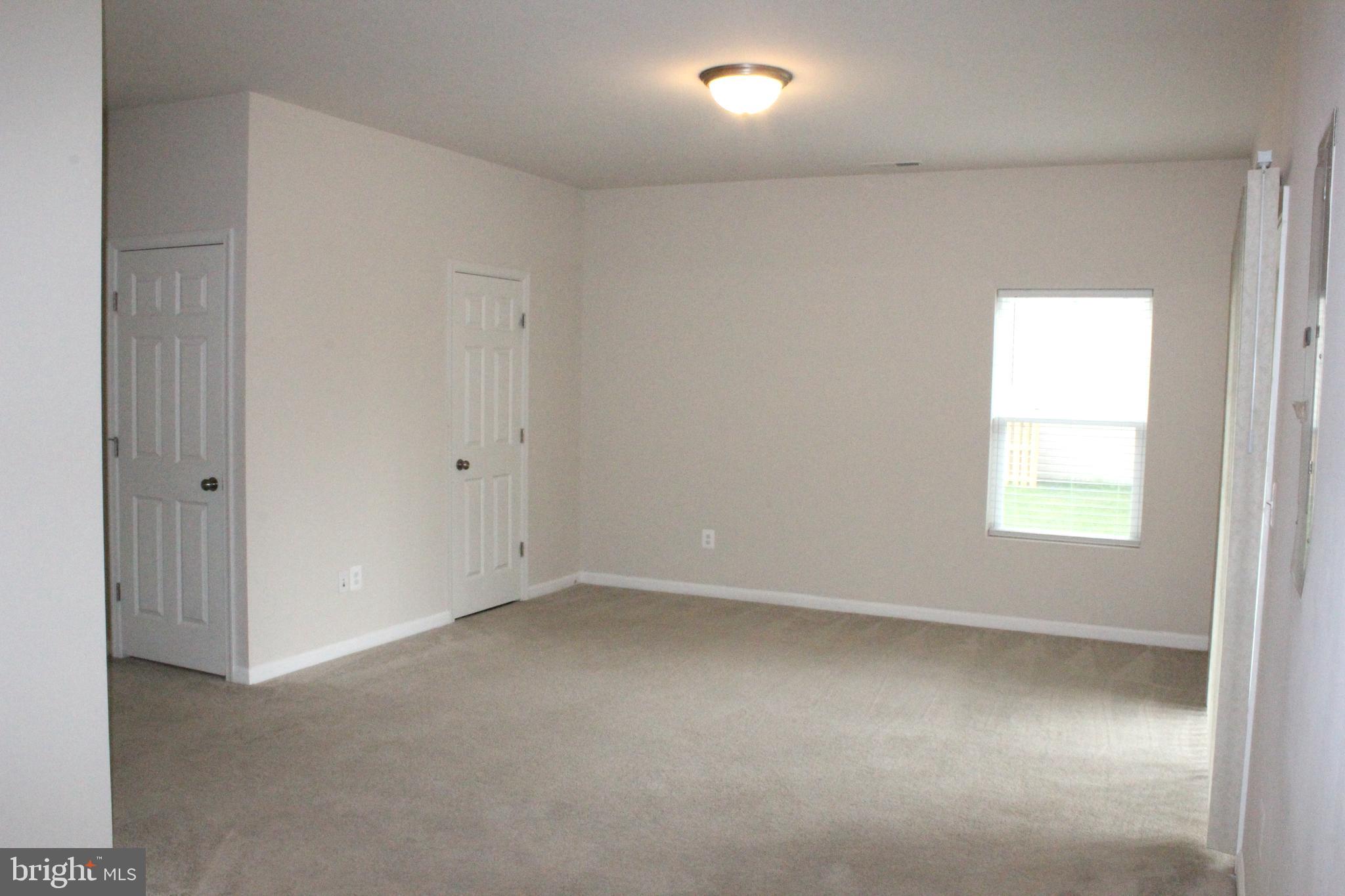 232 Parkland Drive Stephenson, VA 22656 - Photo 17 of 18 an empty room with a window