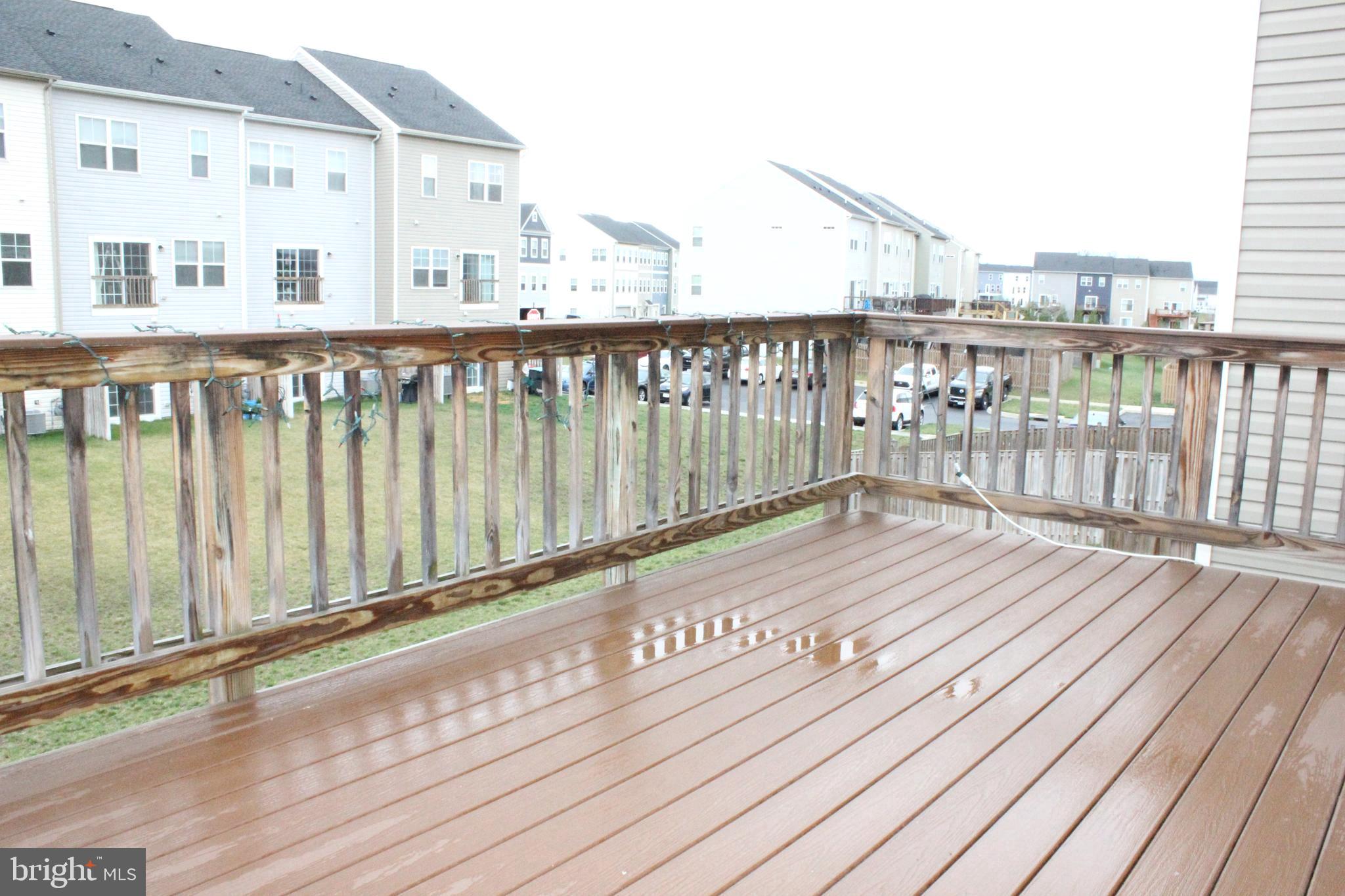 232 Parkland Drive Stephenson, VA 22656 - Photo 7 of 18 a view of a balcony with wooden floor