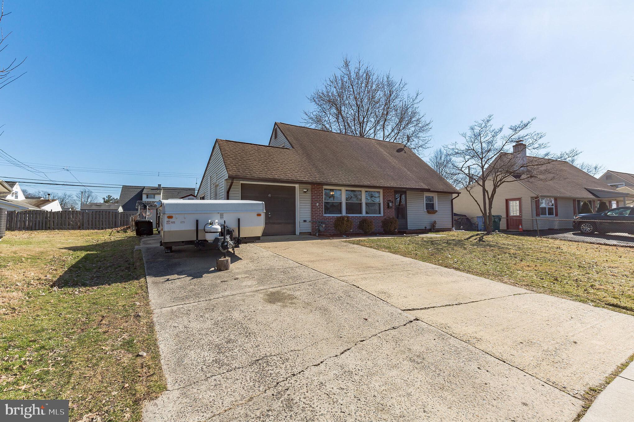 40 Iris Road Levittown, PA 19057 - Photo 4 of 30 4 car driveway and a garage!