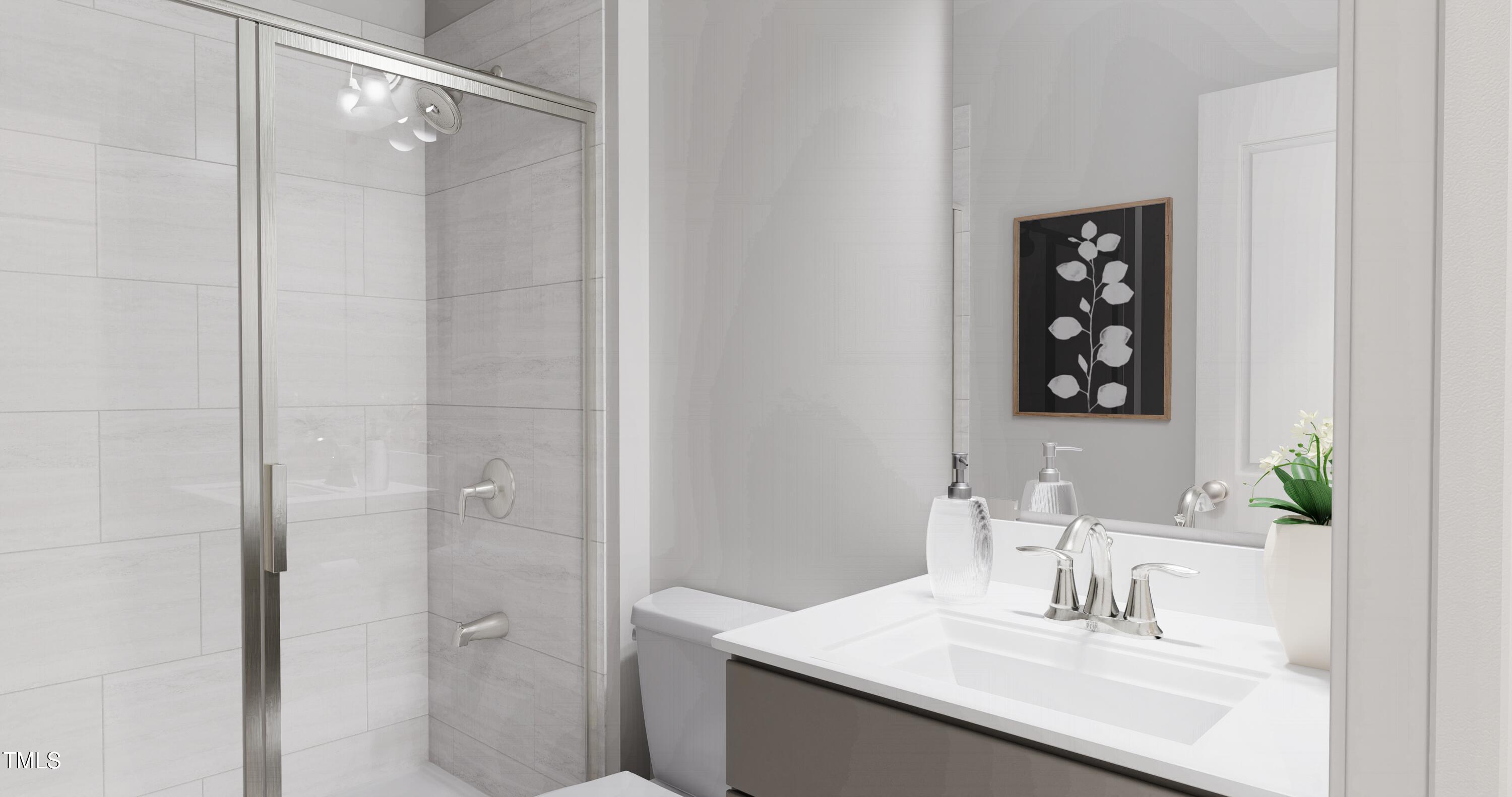 353 Calvander Lane Apex, NC 27539 - Photo 16 of 33 a bathroom with a sink and a mirror