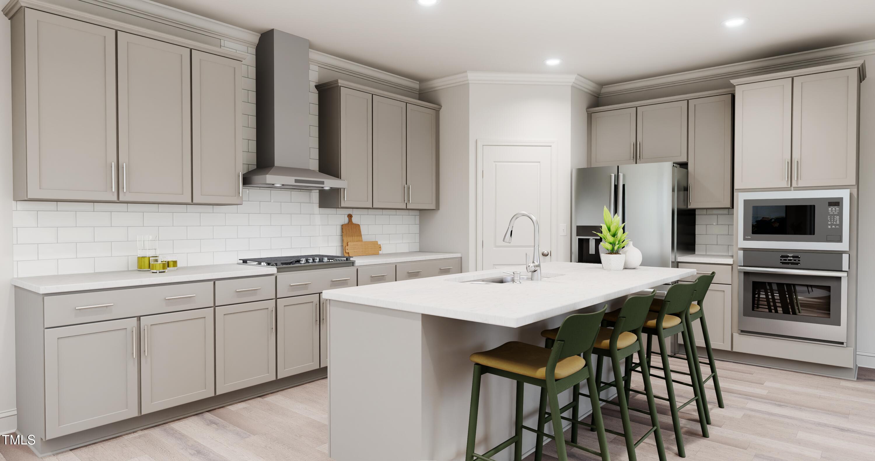 353 Calvander Lane Apex, NC 27539 - Photo 2 of 33 a kitchen with a sink a microwave and cabinets