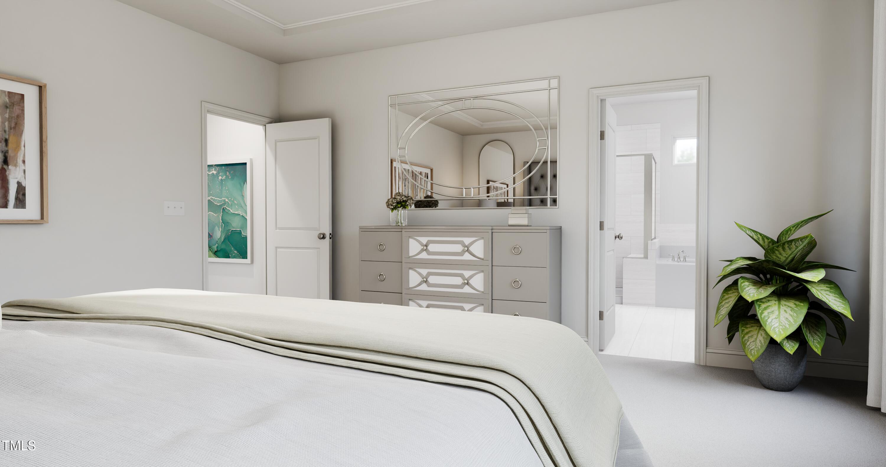 353 Calvander Lane Apex, NC 27539 - Photo 22 of 33 a bedroom with a bed and a potted plant