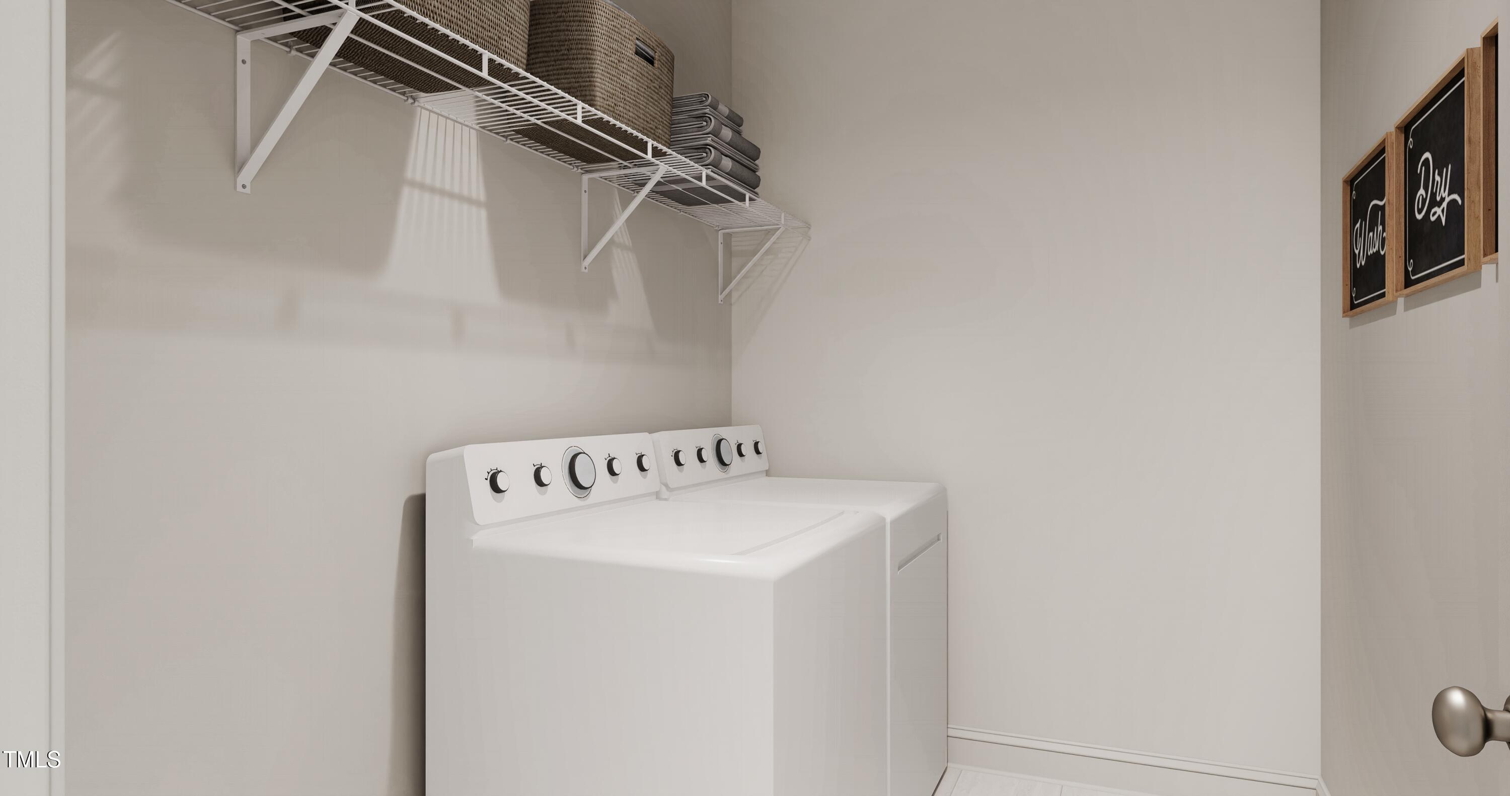 353 Calvander Lane Apex, NC 27539 - Photo 23 of 33 a utility room with dryer and washer