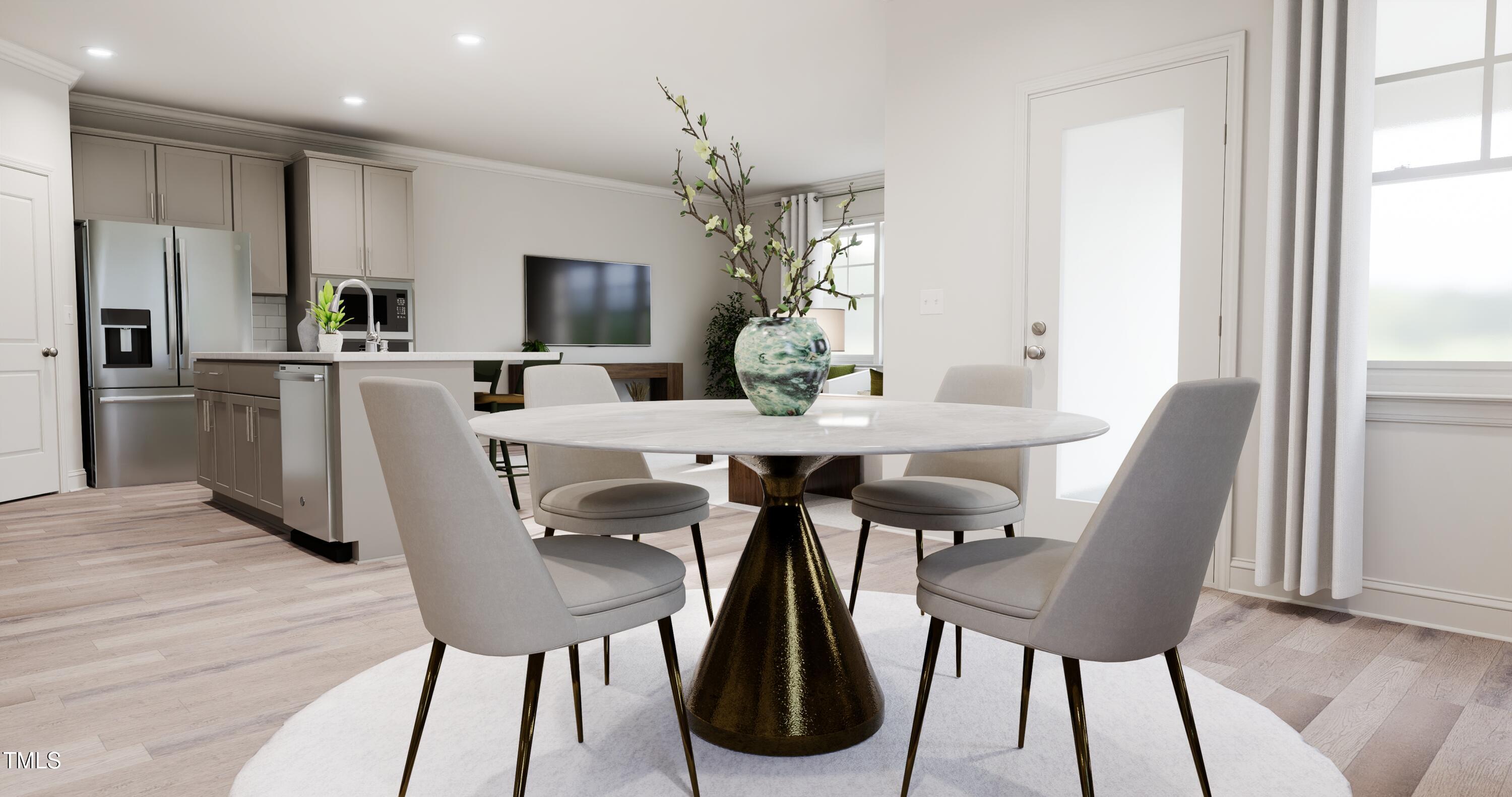 353 Calvander Lane Apex, NC 27539 - Photo 6 of 33 a view of a dining room with furniture window and wooden floor