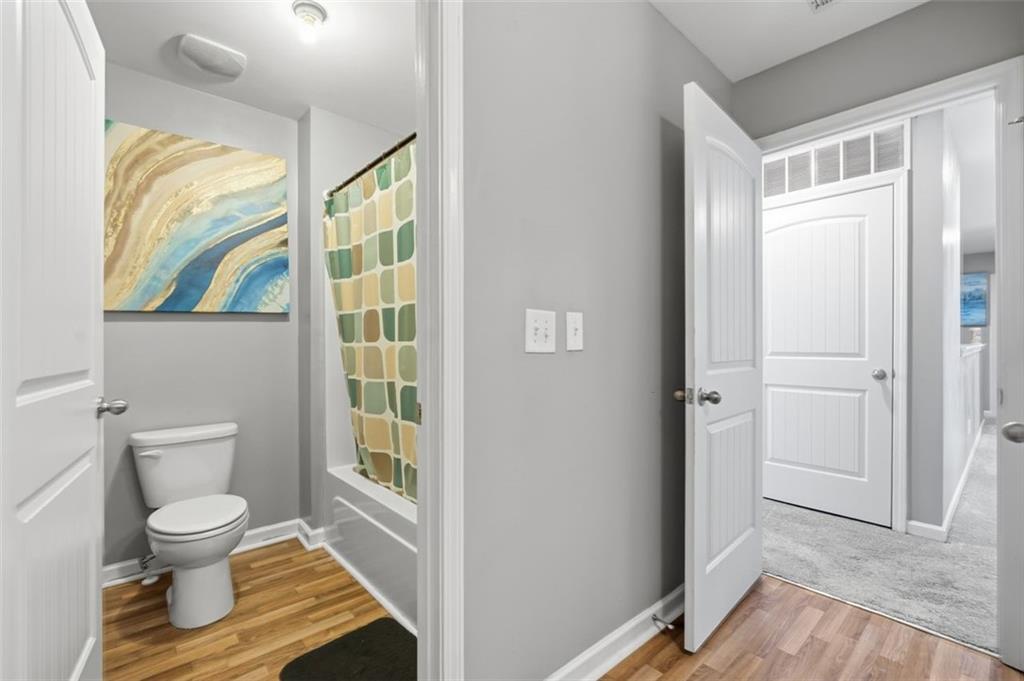 2234 Sawgrass Drive Hampton, GA 30228 - Photo 22 of 28 a bathroom with a toilet and a shower