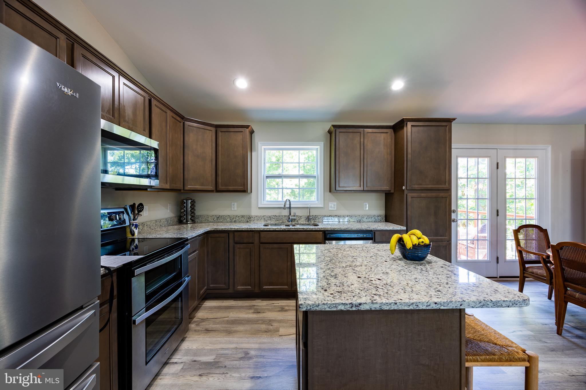 197 Catch Release Court Inwood, WV 25428 - Photo 10 of 53 Island kitchen w/granite counters