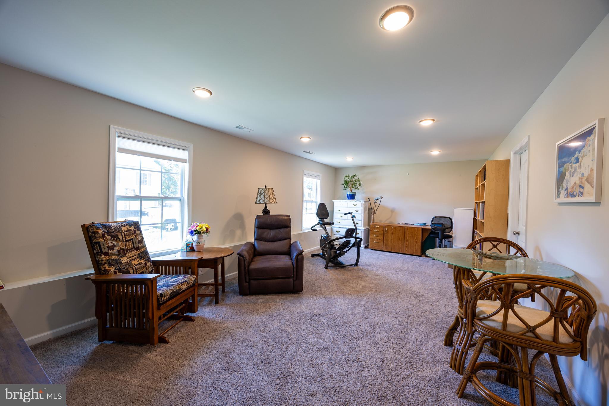 197 Catch Release Court Inwood, WV 25428 - Photo 39 of 53 Lower level rec room offers windows