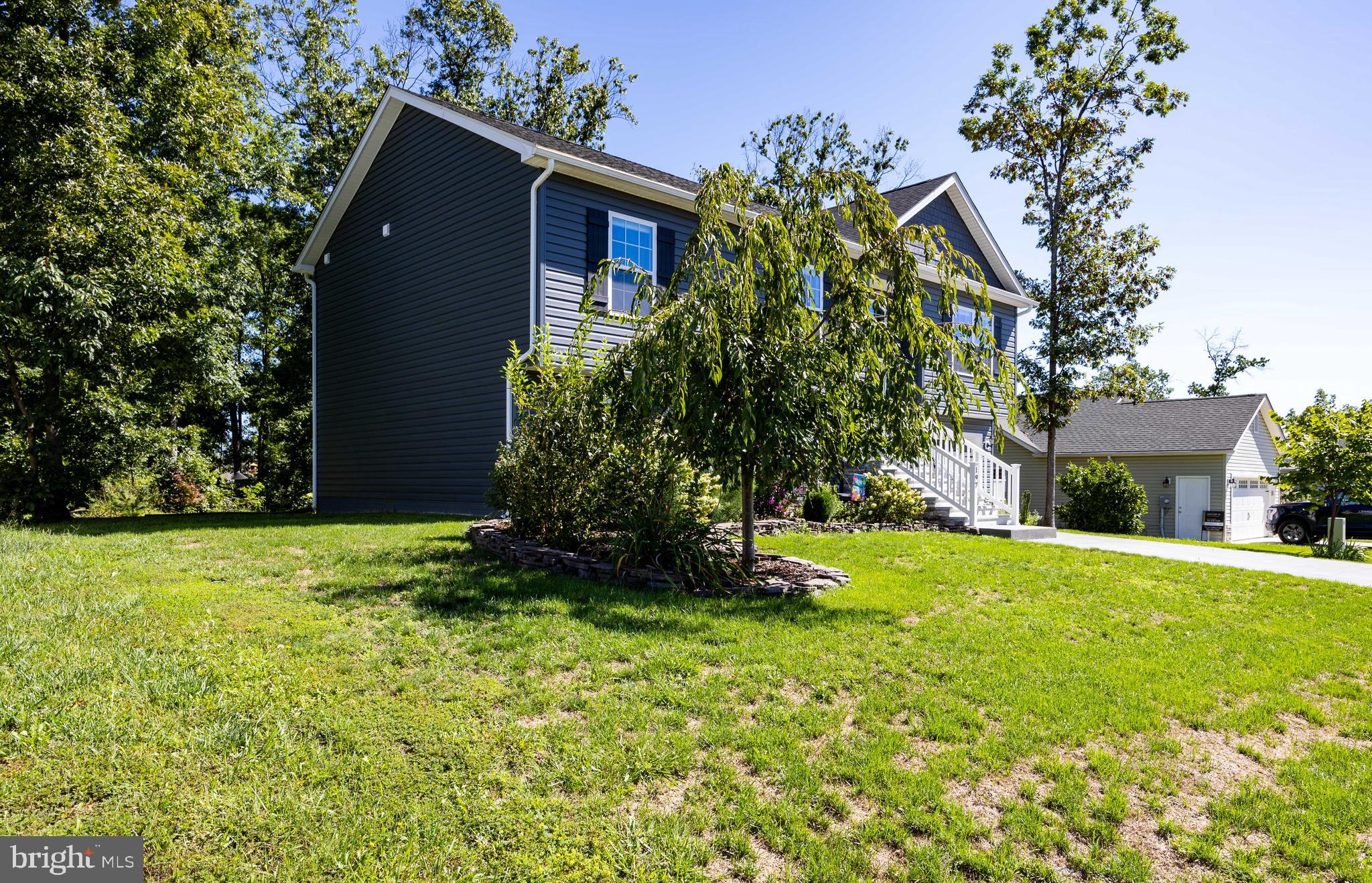 197 Catch Release Court Inwood, WV 25428 - Photo 4 of 53 Great neighborhood with mature trees