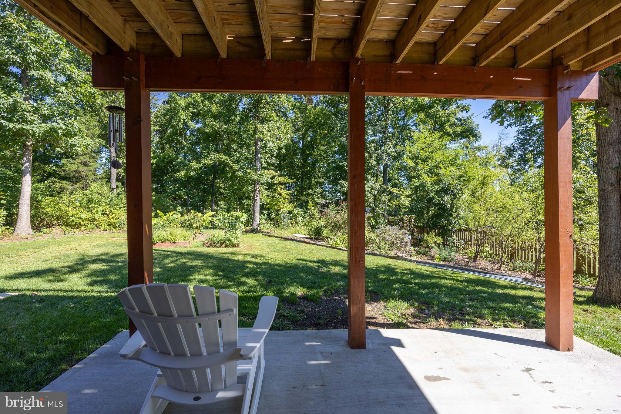 197 Catch Release Court Inwood, WV 25428 - Photo 8 of 53 Concrete patio with access to garage