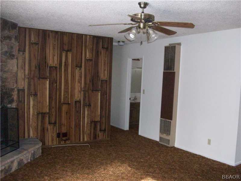 402 Riverside Sugarloaf, CA 92386 - Photo 11 of 18 wooden floor in an empty room