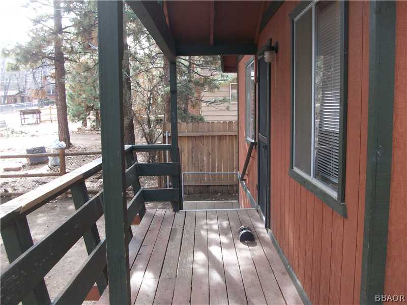 402 Riverside Sugarloaf, CA 92386 - Photo 15 of 18 a view of balcony with wooden floor
