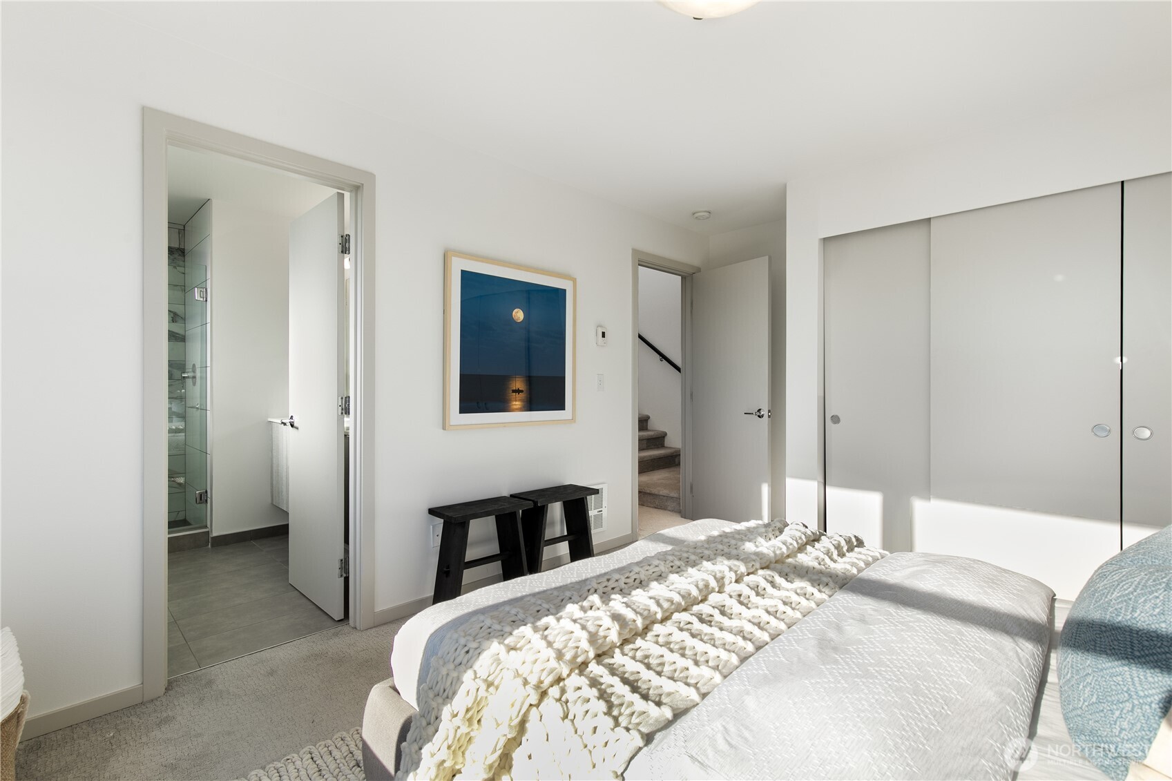 6729 14th Avenue Northwest, Unit B Seattle, WA 98117 - Photo 14 of 36 a bedroom with a bed and a fireplace