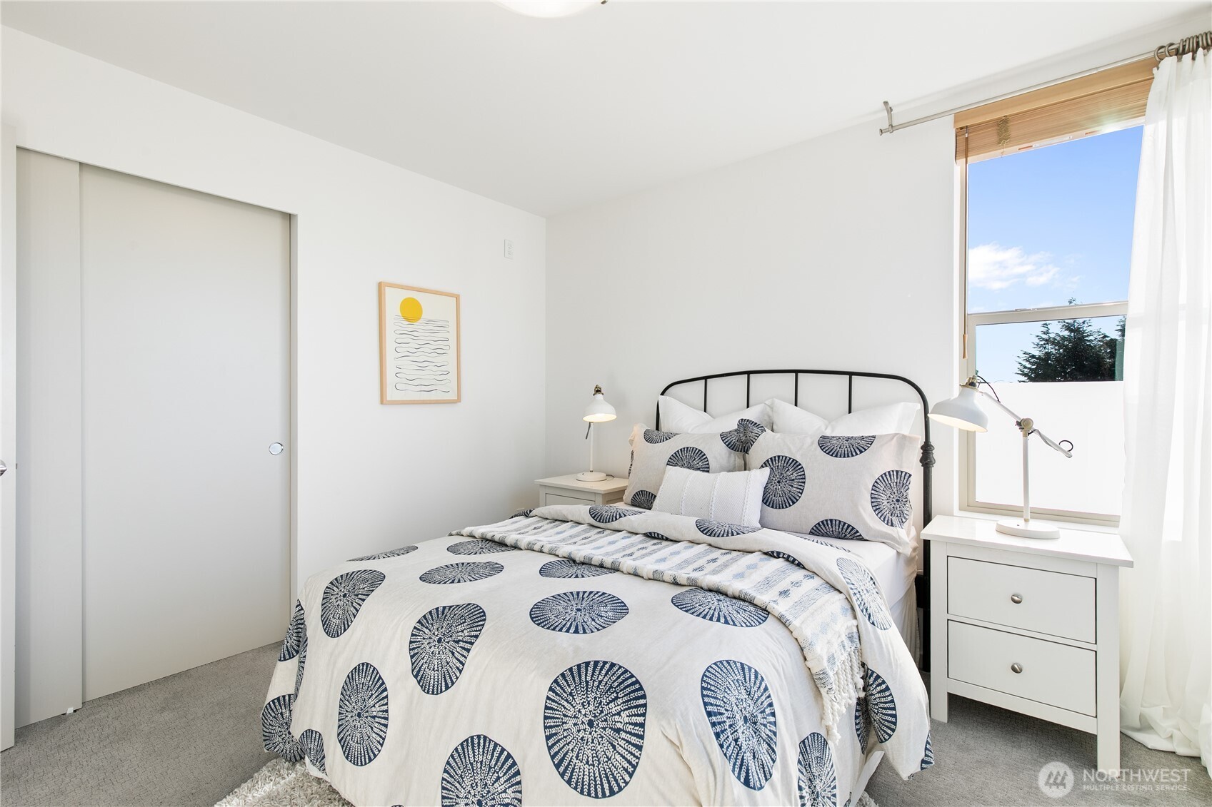 6729 14th Avenue Northwest, Unit B Seattle, WA 98117 - Photo 18 of 36 a bedroom with a bed and a window