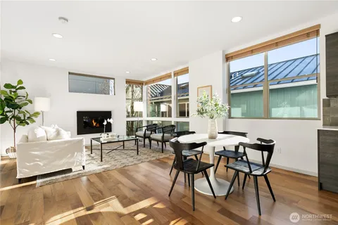 a view of a livingroom with furniture and a fireplace