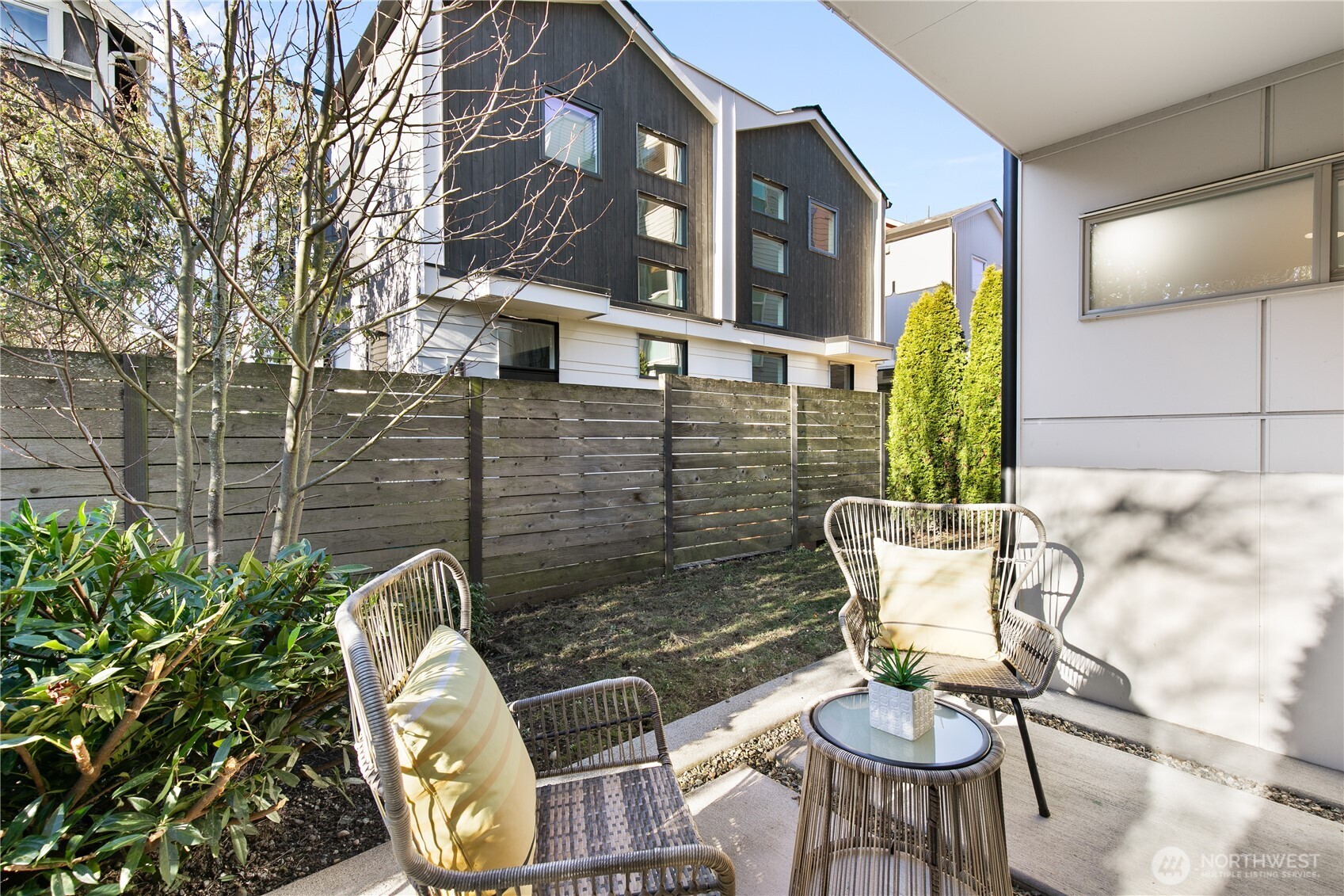 6729 14th Avenue Northwest, Unit B Seattle, WA 98117 - Photo 22 of 36 a view of a chairs and tables in patio