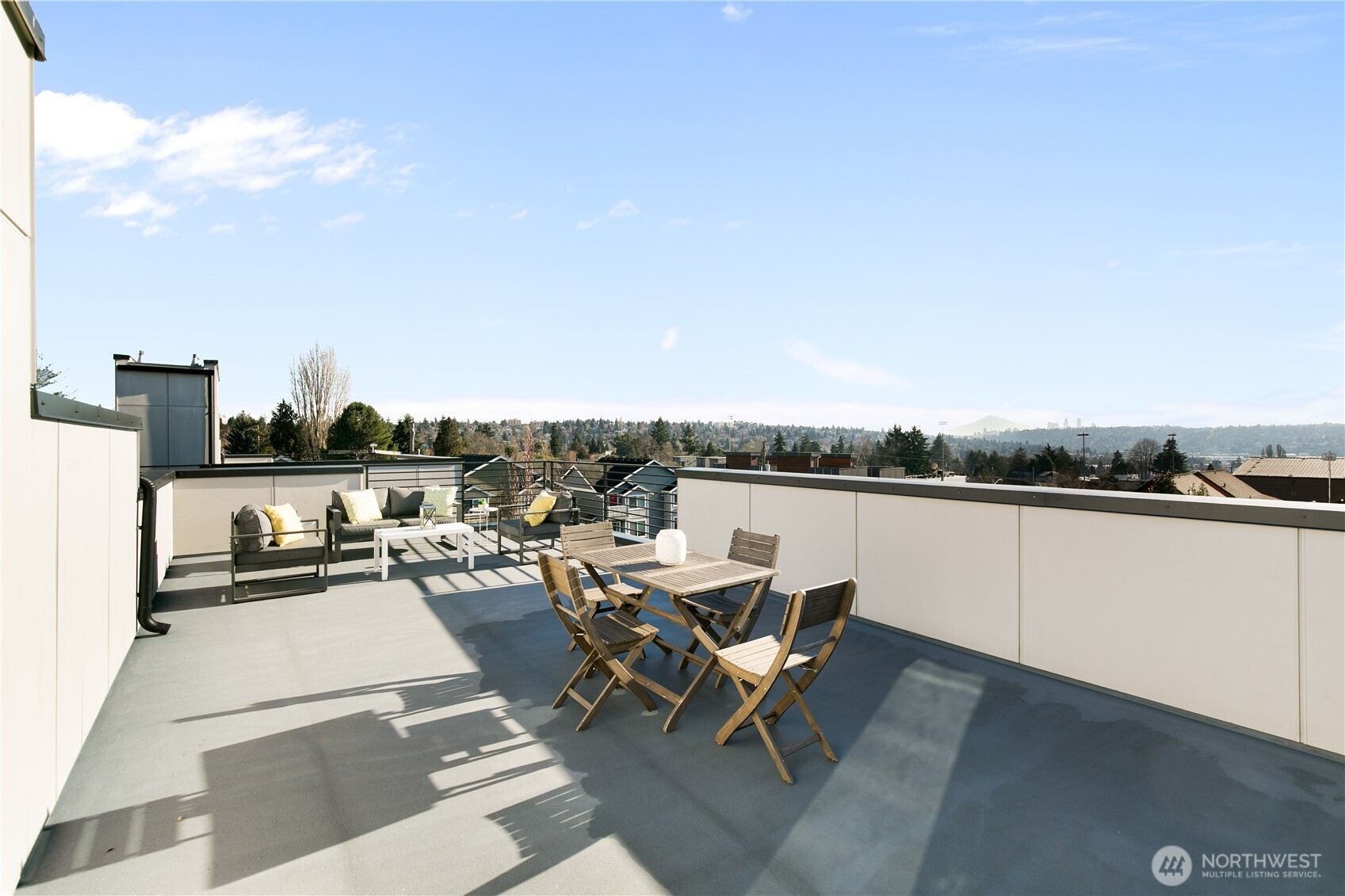 6729 14th Avenue Northwest, Unit B Seattle, WA 98117 - Photo 27 of 36 a view of a terrace with sitting area