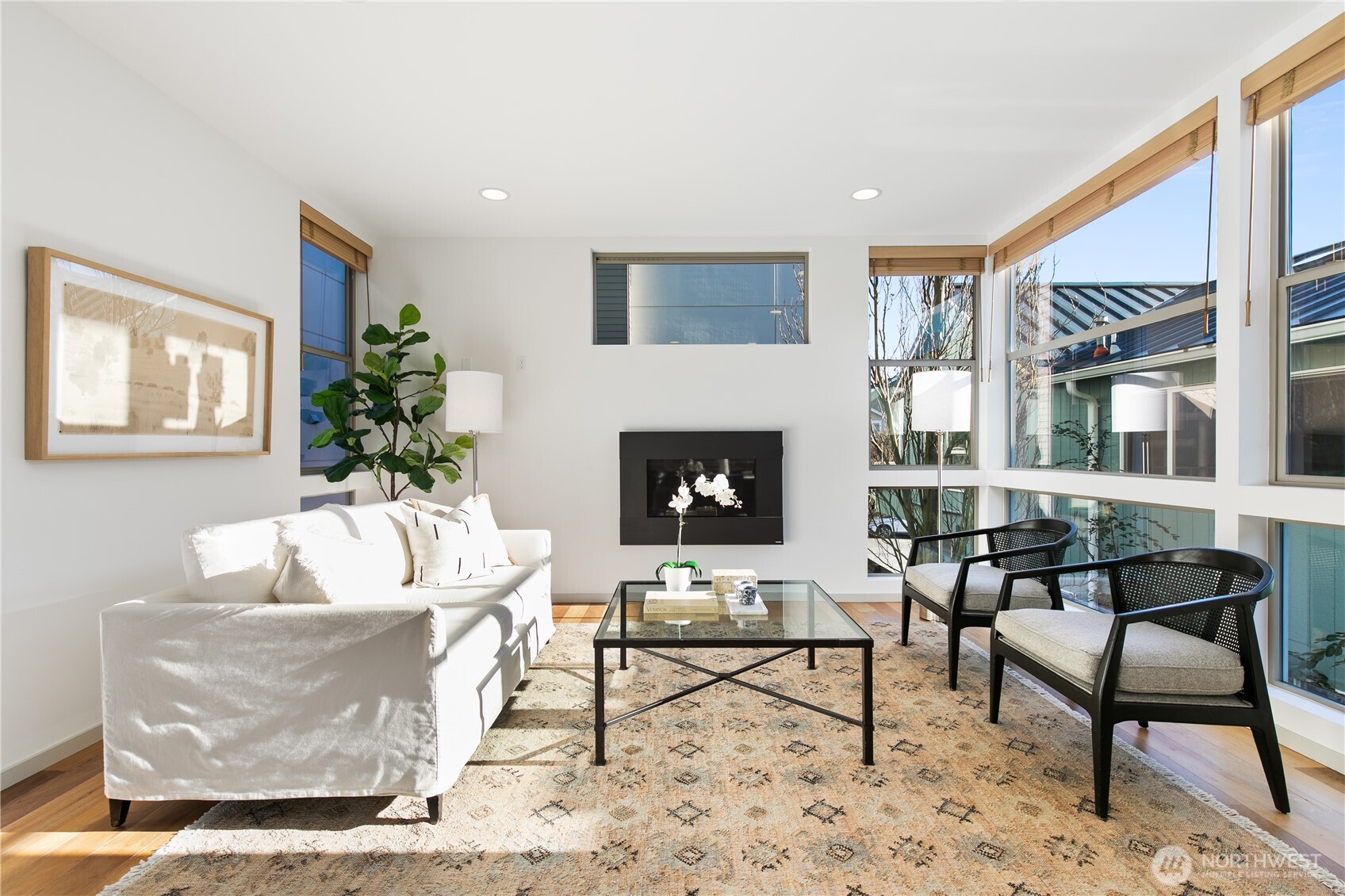 6729 14th Avenue Northwest, Unit B Seattle, WA 98117 - Photo 3 of 36 a living room with furniture and a fireplace